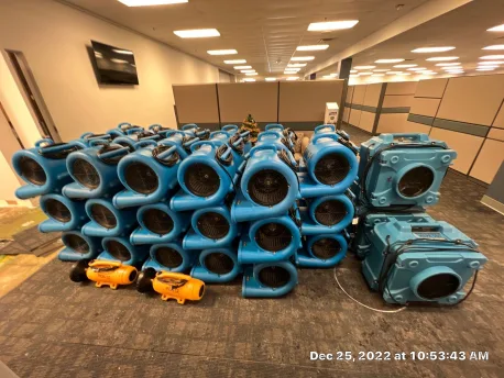 Centrifugal air movers, desiccant dehumidifiers and air scrubbers staged for commercial water mitigation