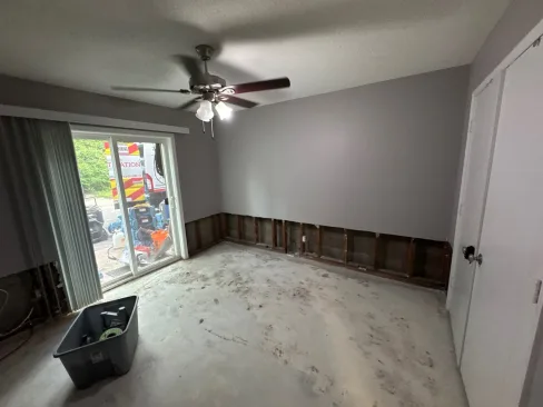 Flood cut in apartment drywall showing the height water reached during the flood