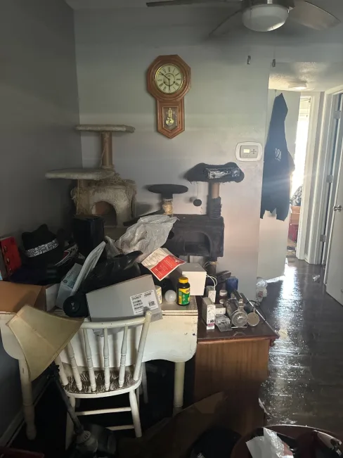 Water damage to flooring and walls inside a flooded Kansas City apartment